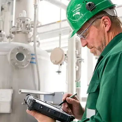 Service technician working on a machine