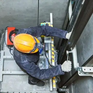 Worker in Elevator Shaft using Elevator Software