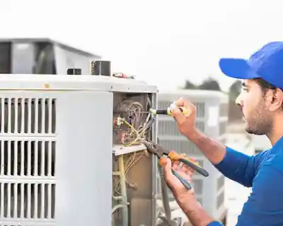 HVAC Tech in Blue Hat