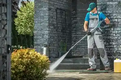 Worker using Pressure Washing Software