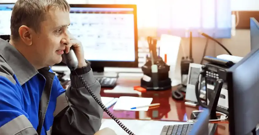 Worker on Desk Phone